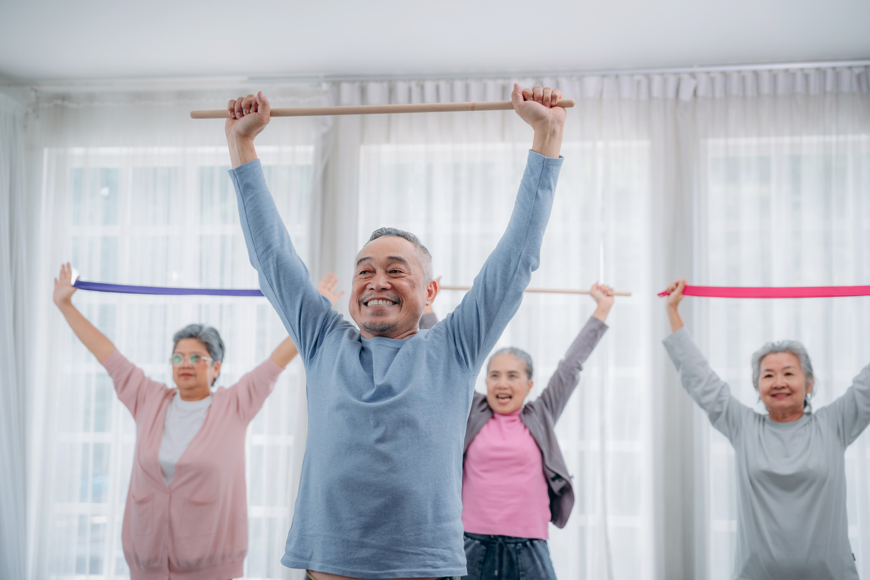 Elderly group resistance band exercise